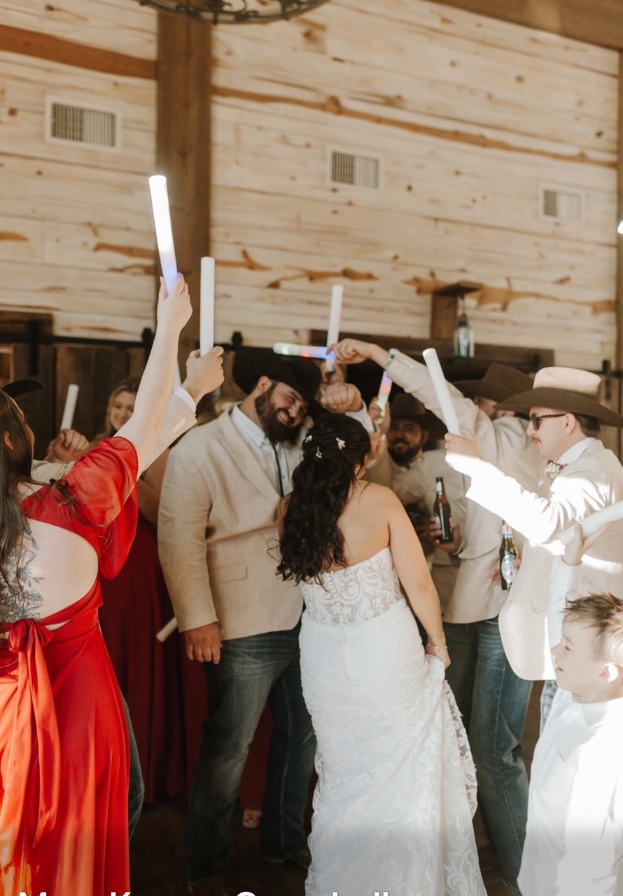 Guests dancing at an indoor wedding