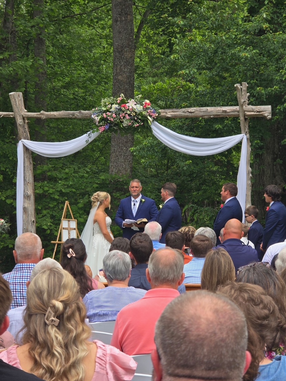 A bride and groom are saying their vows