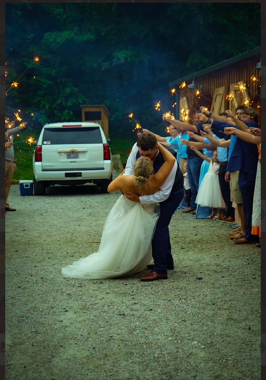 A bride and groom kissing